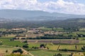 Panoramic view of valley,ÃÂ cultivated fruits plantations, forests, farms, mountains on horizon from uptown medieval village Royalty Free Stock Photo